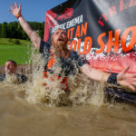 Two participants submerged in Arctic Enema